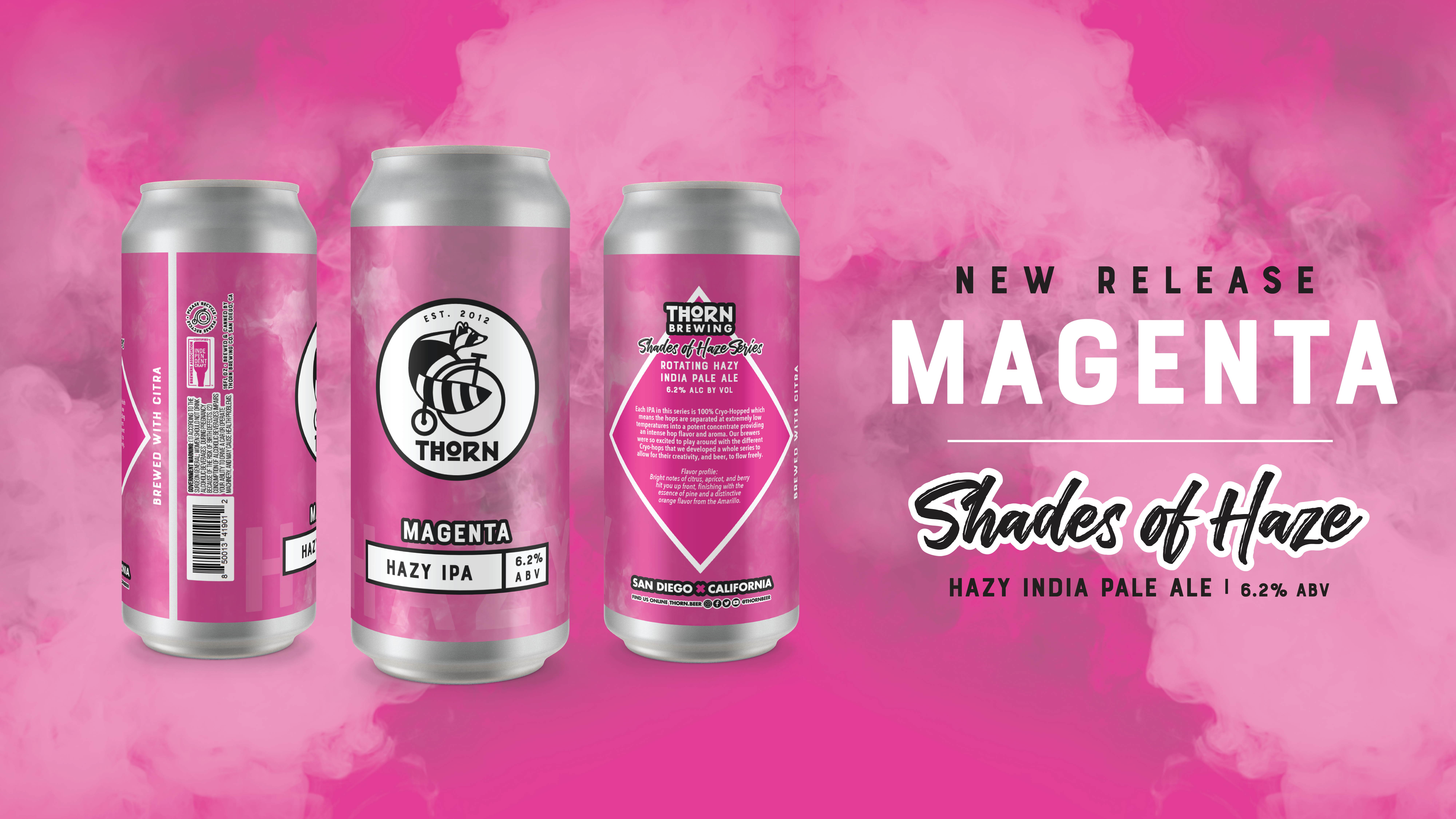 magenta hazy ipa beer can on a pink and smokey background