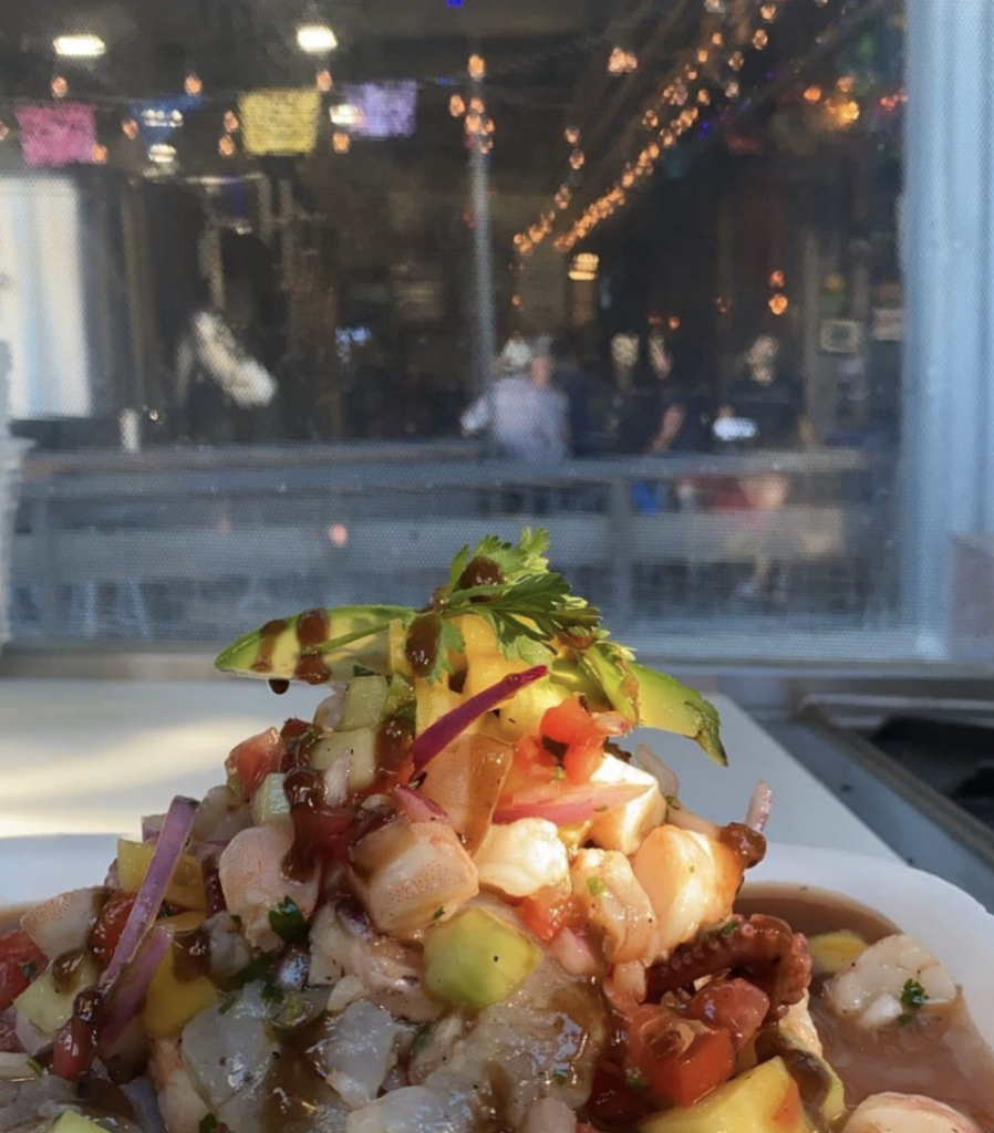 ceviche in front of the big window at the front of thorn brewing tasting room.