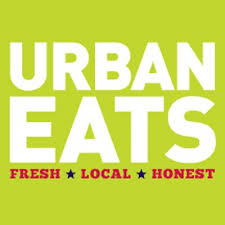 Logo for Urban Eats, a food truck. White and red letters on a lime green background